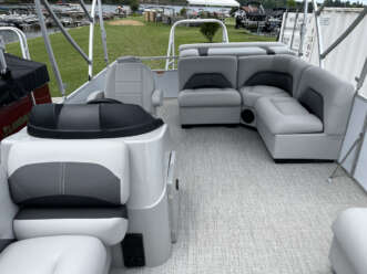 Gray and white pontoon boat interior.