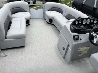 Grey boat seats with control panel.