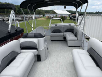 Interior of a pontoon boat with seating.