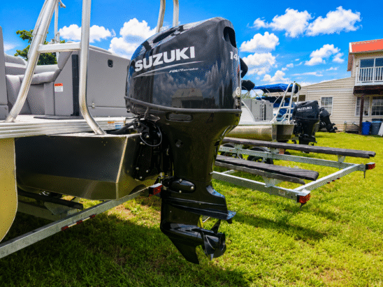 Black Suzuki outboard motor on boat